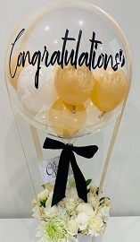 15 white flowers roses basket with 3 pink white Balloon in colourless balloon with congratulations print on balloon